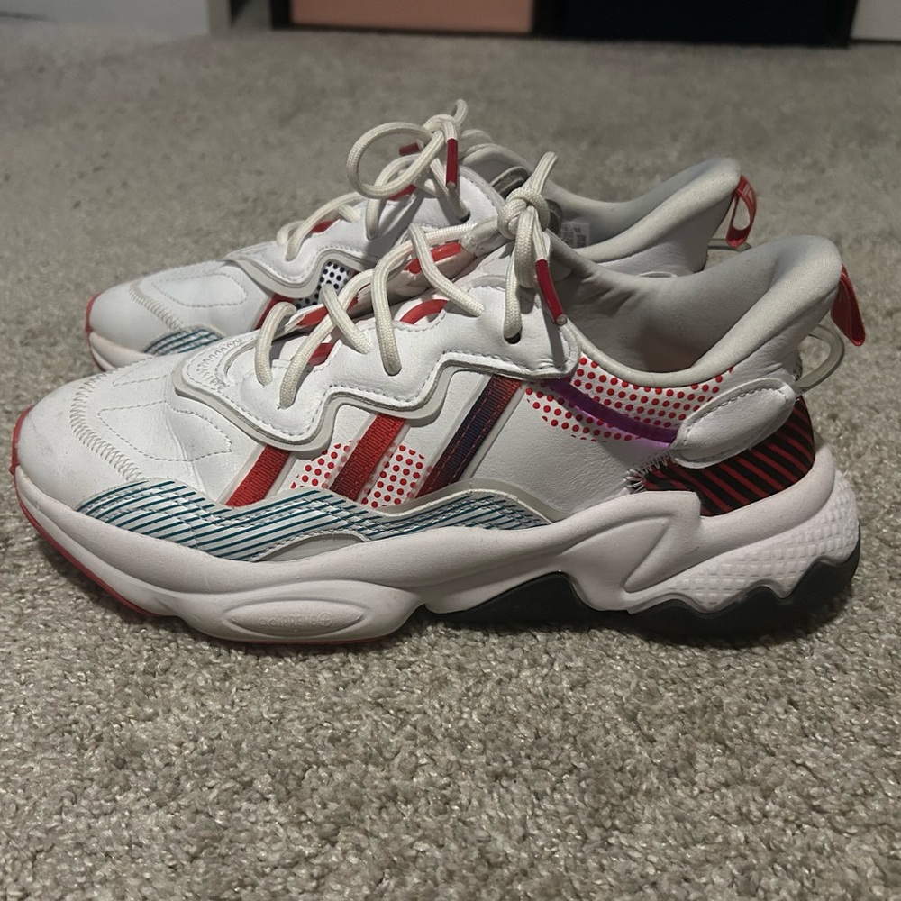Adidas white sneakers with colorful stripes